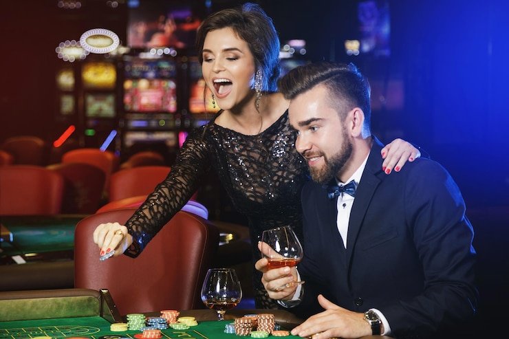 Mobile phone screen showing live blackjack dealer interface with betting controls